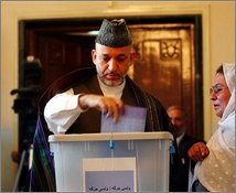 Afghan President Hamid Karzi votes